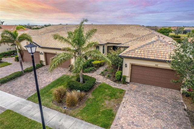 view of front of home featuring a garage