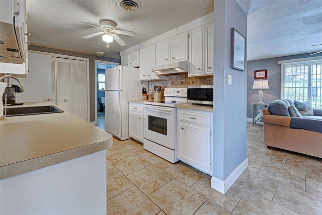 kitchen with white cabinetry, ceiling fan, decorative backsplash, white appliances, and sink