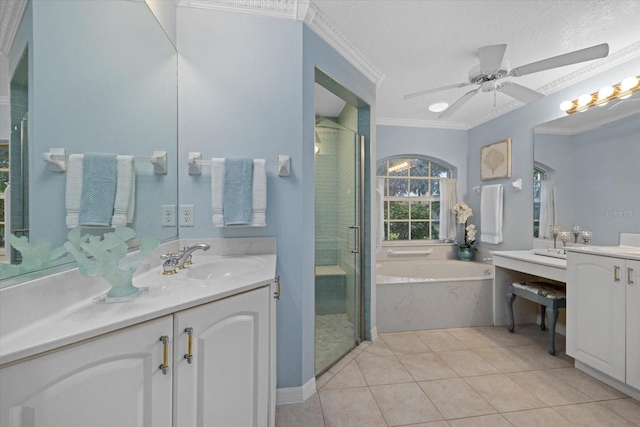 bathroom featuring tile patterned flooring, vanity, ornamental molding, ceiling fan, and shower with separate bathtub