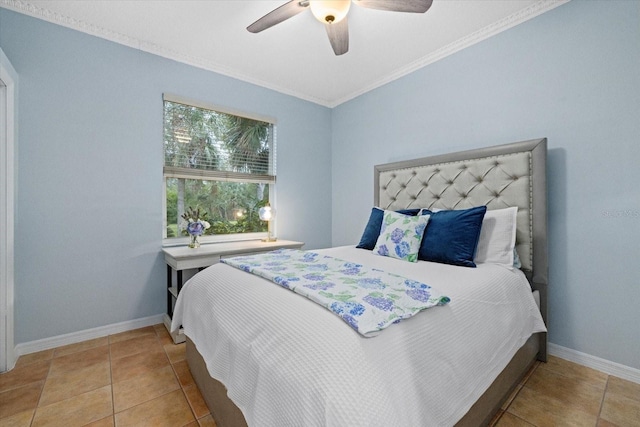 tiled bedroom with ceiling fan and crown molding