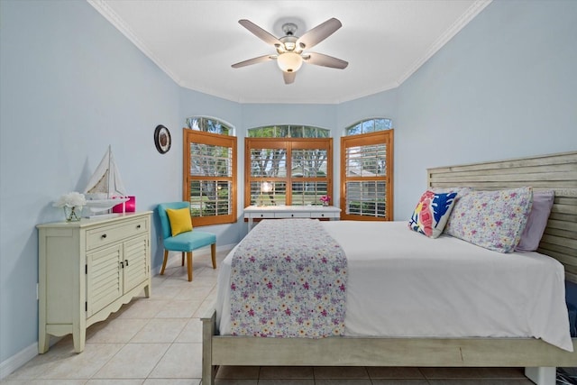 tiled bedroom with ceiling fan and crown molding