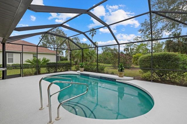 view of pool featuring a lanai and a patio