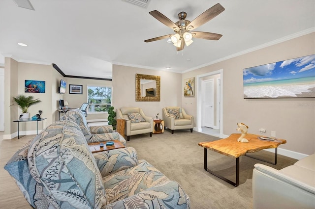 living room with ceiling fan and crown molding