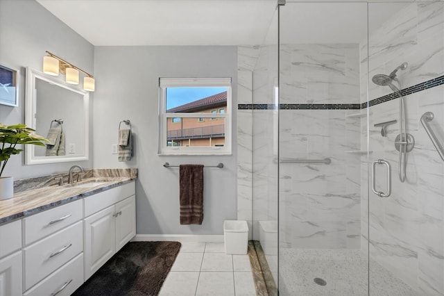 bathroom with vanity, tile patterned floors, and an enclosed shower