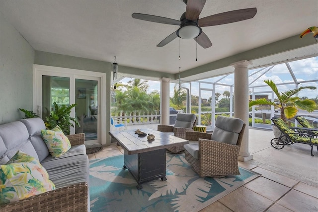 sunroom / solarium with ceiling fan