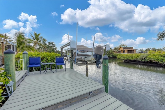 view of dock with a water view