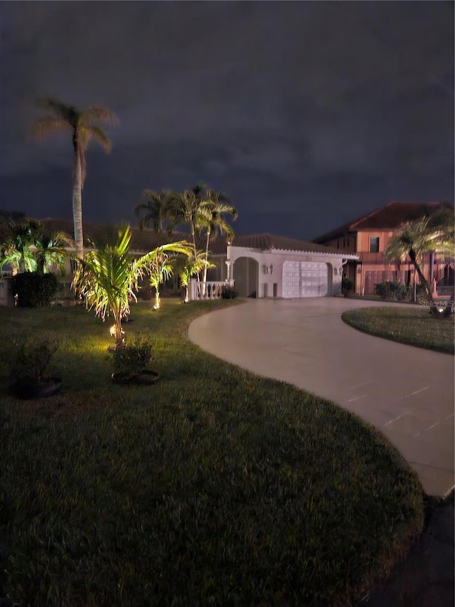 view of front of property with a lawn