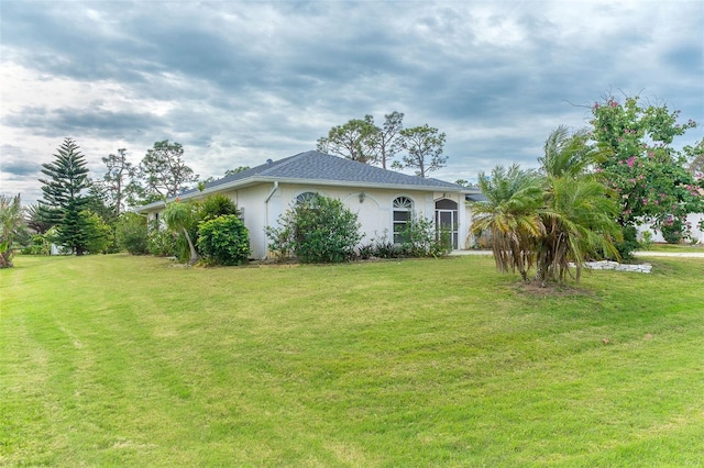 exterior space with a yard