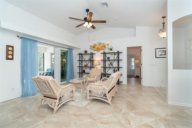 sitting room featuring ceiling fan and lofted ceiling