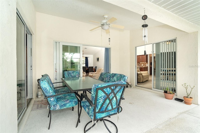 view of patio / terrace featuring ceiling fan