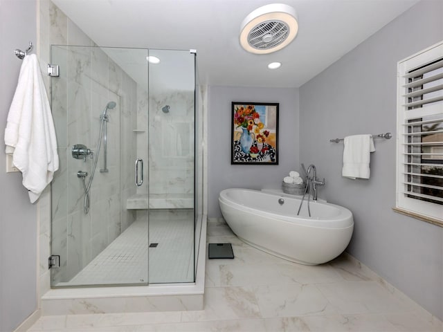 bathroom featuring plus walk in shower