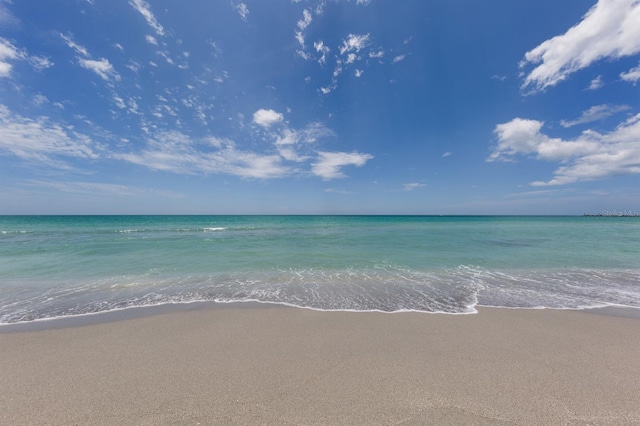 view of water feature with a beach view