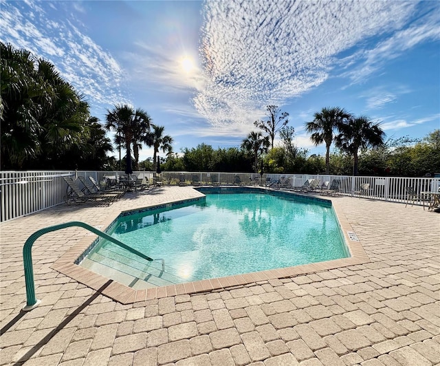 view of pool featuring a patio