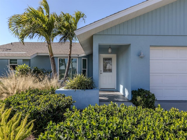 property entrance featuring a garage