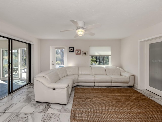 living room with ceiling fan