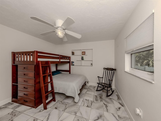 bedroom featuring ceiling fan