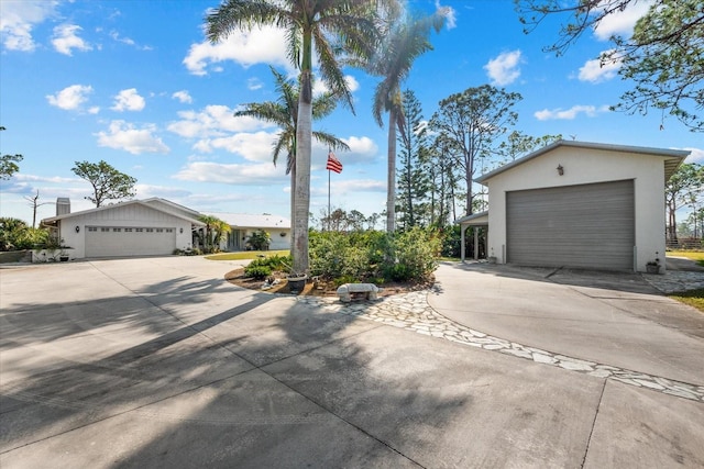 single story home with a garage