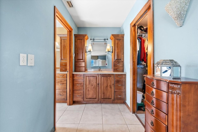 hallway with light tile patterned flooring