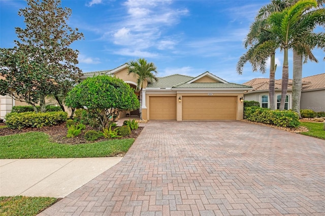 view of front of property with a garage