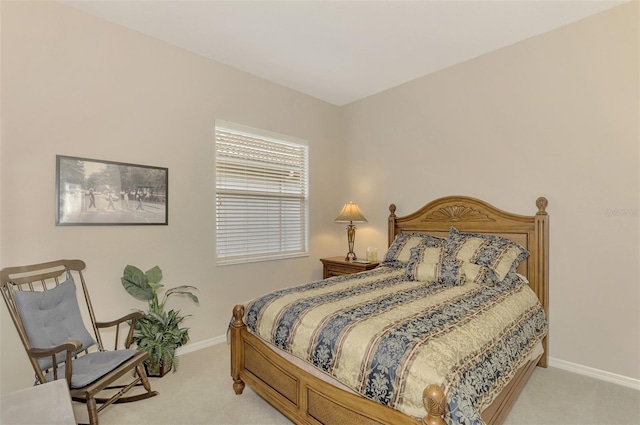 bedroom with light carpet