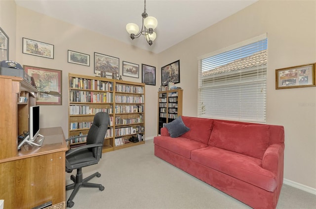 office space featuring an inviting chandelier and carpet