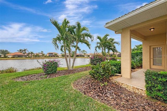 view of yard with a water view