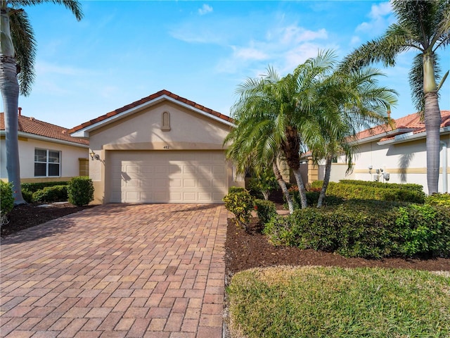 view of front of property featuring a garage