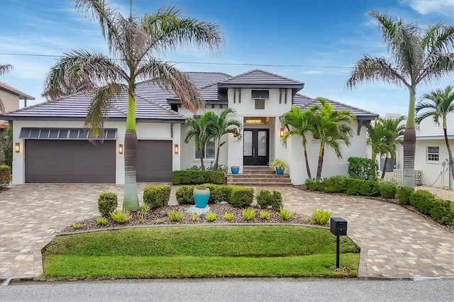 view of front of property featuring a garage