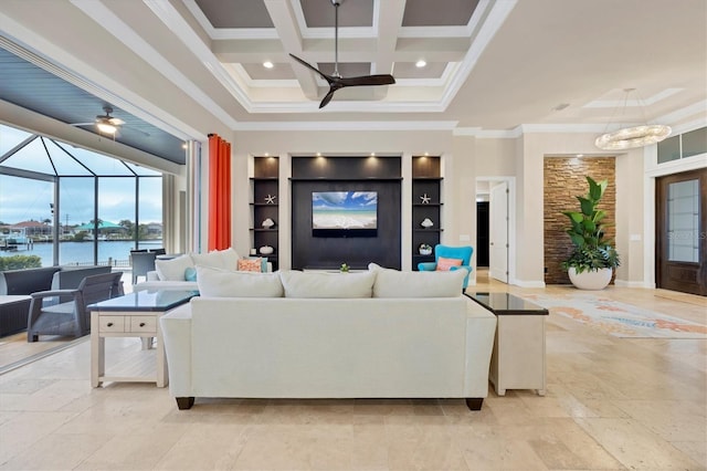 living room with built in shelves, a water view, ceiling fan, beam ceiling, and coffered ceiling