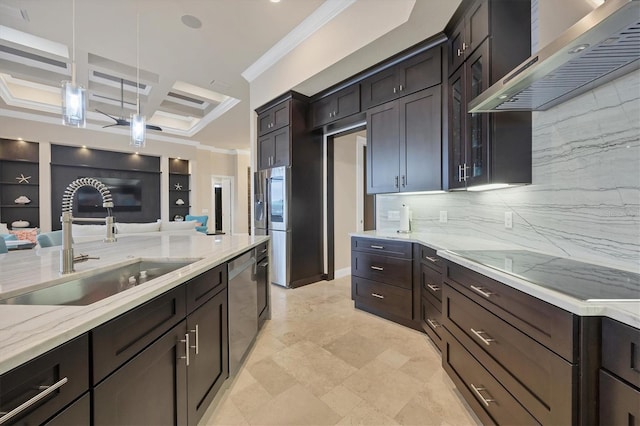 kitchen with dishwasher, wall chimney range hood, sink, hanging light fixtures, and coffered ceiling