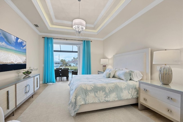 bedroom featuring crown molding, a notable chandelier, and a raised ceiling