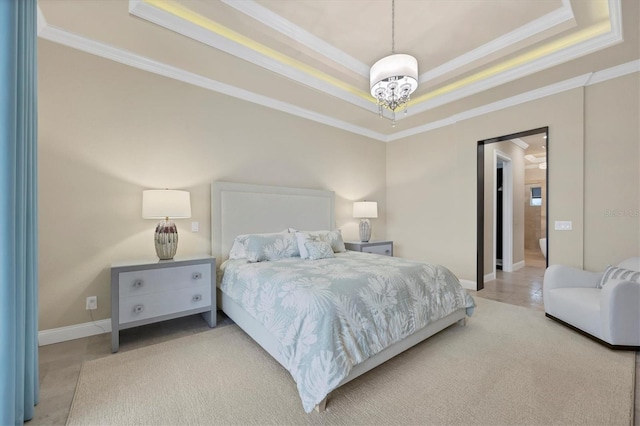 bedroom featuring ornamental molding, a raised ceiling, and a notable chandelier