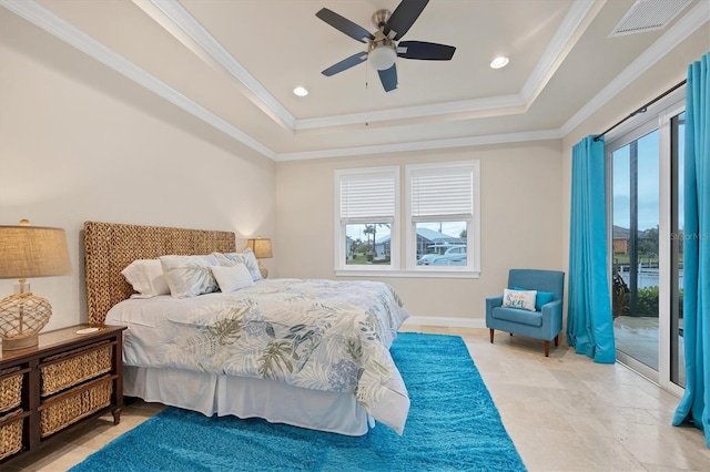 bedroom with ceiling fan, a raised ceiling, access to exterior, and multiple windows