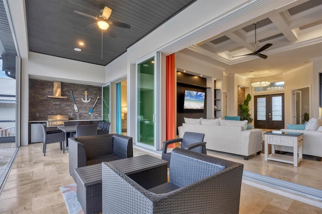 view of patio with an outdoor kitchen, outdoor lounge area, ceiling fan, and french doors