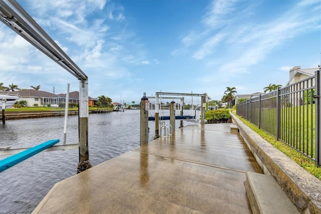 dock area featuring a water view