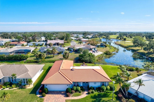 bird's eye view with a water view