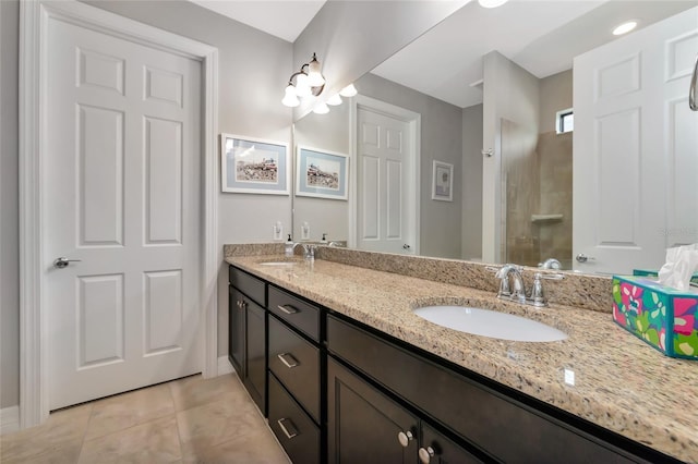 bathroom with vanity and tile patterned floors