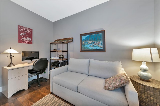 home office with dark hardwood / wood-style flooring