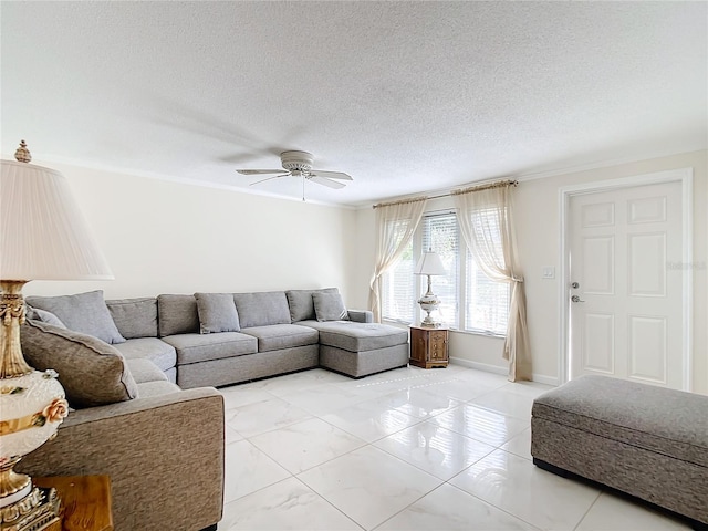 living room featuring a textured ceiling and ceiling fan