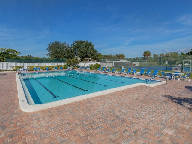 view of pool featuring a patio area