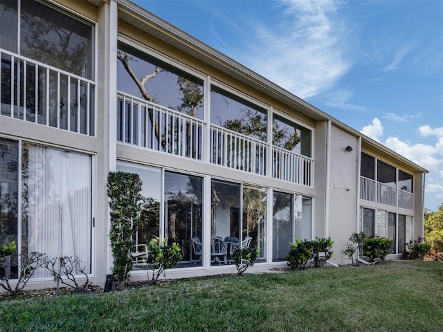 exterior space with a lawn