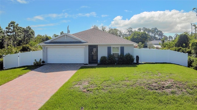 ranch-style home with a front lawn and a garage