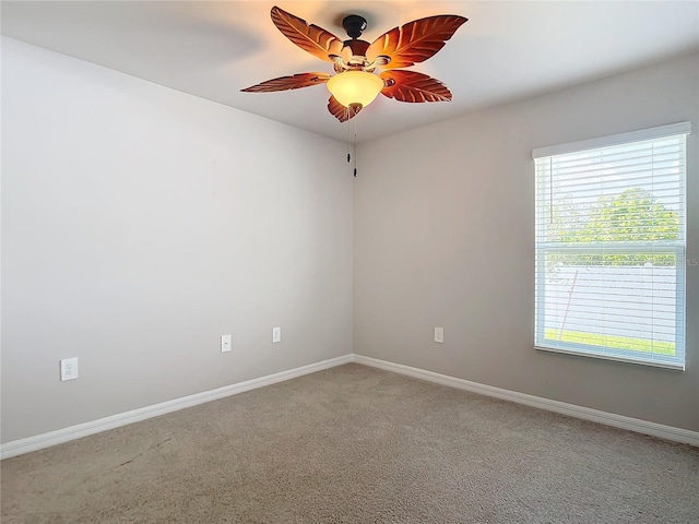 unfurnished room featuring carpet flooring and ceiling fan