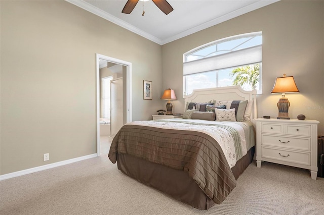 carpeted bedroom featuring ceiling fan, ornamental molding, and ensuite bath