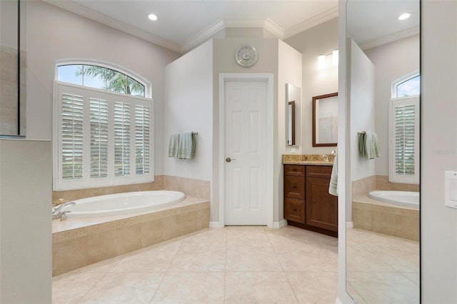 bathroom featuring crown molding, tile patterned floors, a bath, and vanity