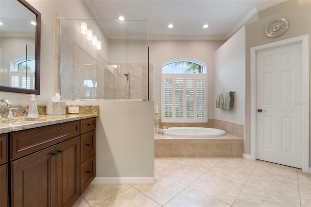 bathroom featuring crown molding, a bath, a walk in shower, vanity, and tile patterned flooring