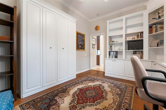 office space featuring baseboards, ornamental molding, built in features, and dark wood-style flooring