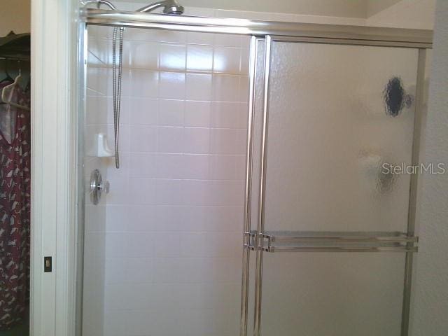 bathroom featuring a stall shower