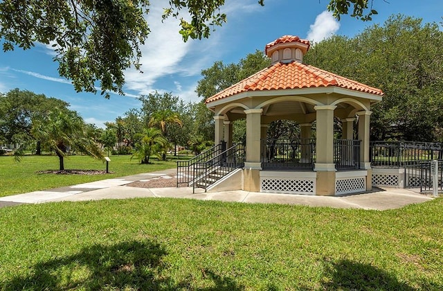 view of home's community with a yard and a gazebo