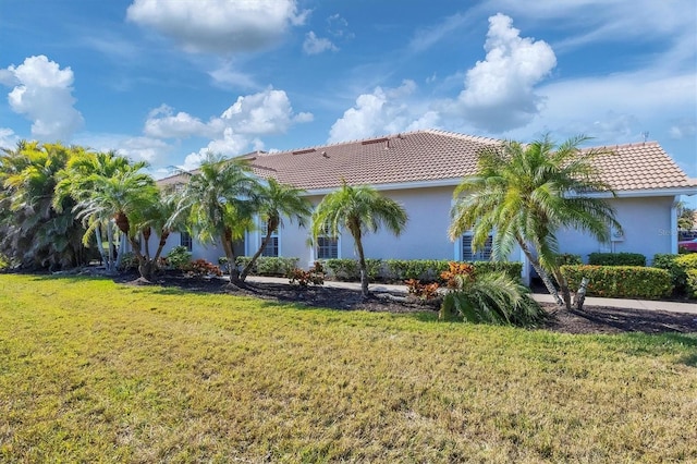 exterior space with a lawn